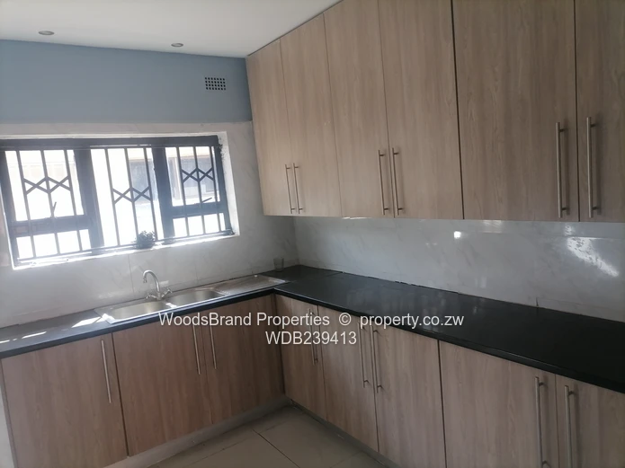Neat 4 bedroomed house with ensuite, modern fitted kitchen on 300sqm. Ready for title